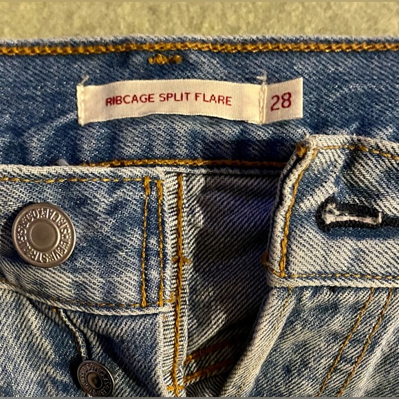 Levi’s Ribcage Flare Jeans. Light wash rigid denim. 28W32L but fits like 26-27. - Picture 3 of 4